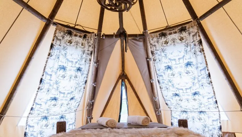 The interior of the ultimate tipi, a premium accommodation option at Lost Village.