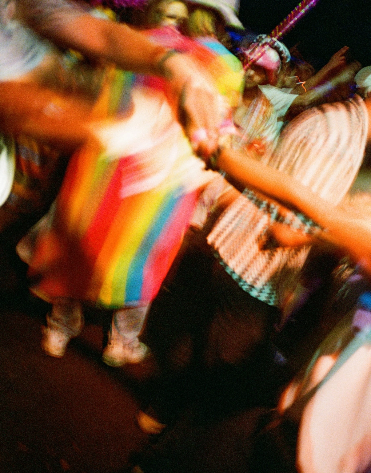 A blurry photograph of revellers at Lost Village.